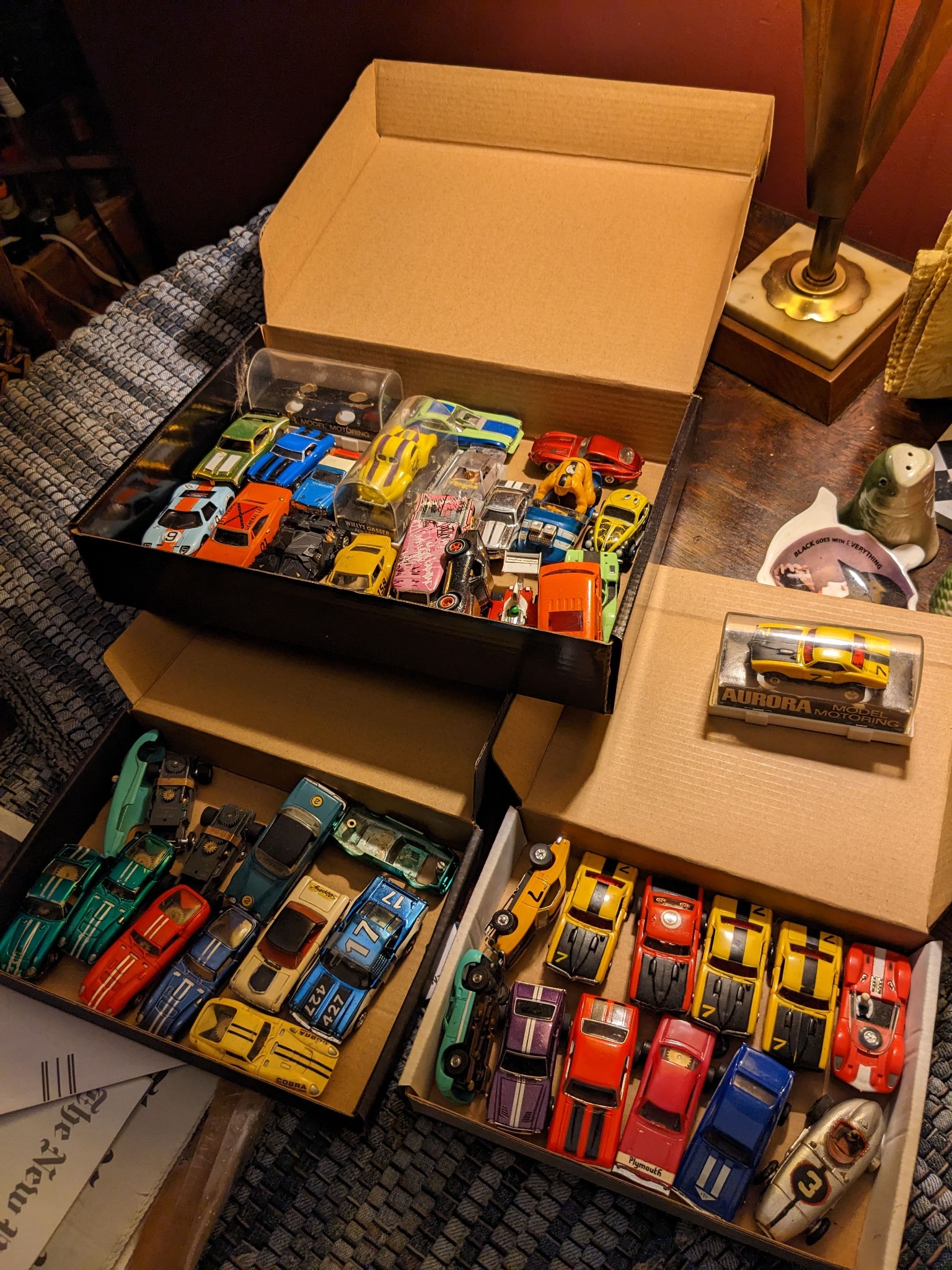 Boxes and trays filled with vintage diecast and slot cars